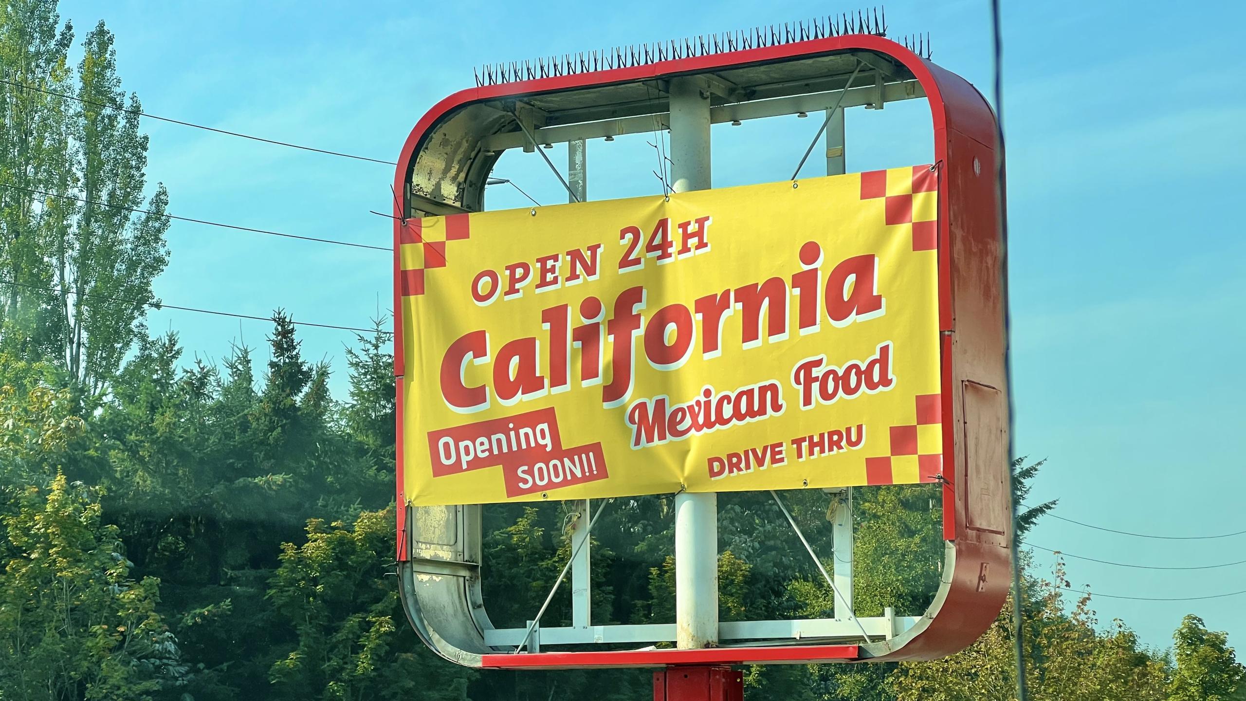 The California Mexican Food restaurant pre-opening sign in Bellevue, Washington.