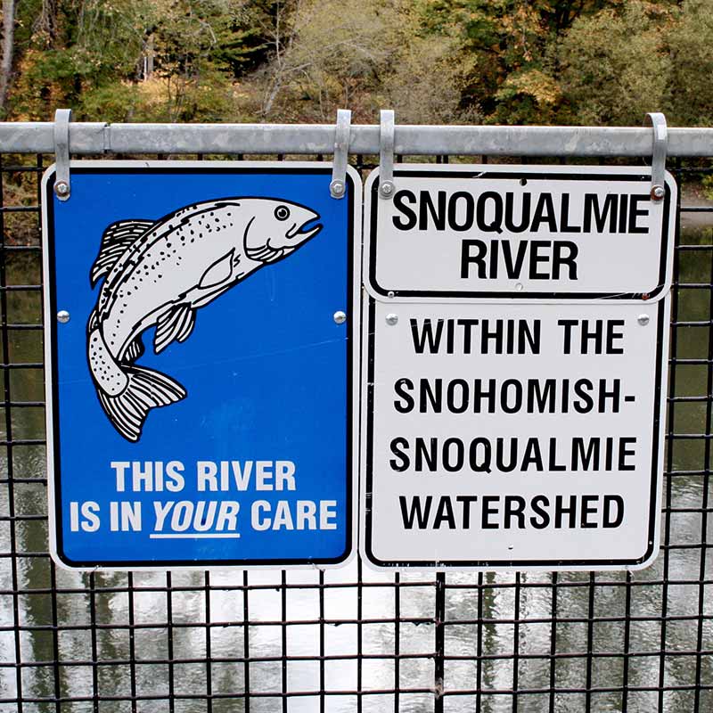 Sign on a bridge over the Snoqualmie River. This river is in your care. Within the Snohomish-Snoqualmie watershed.