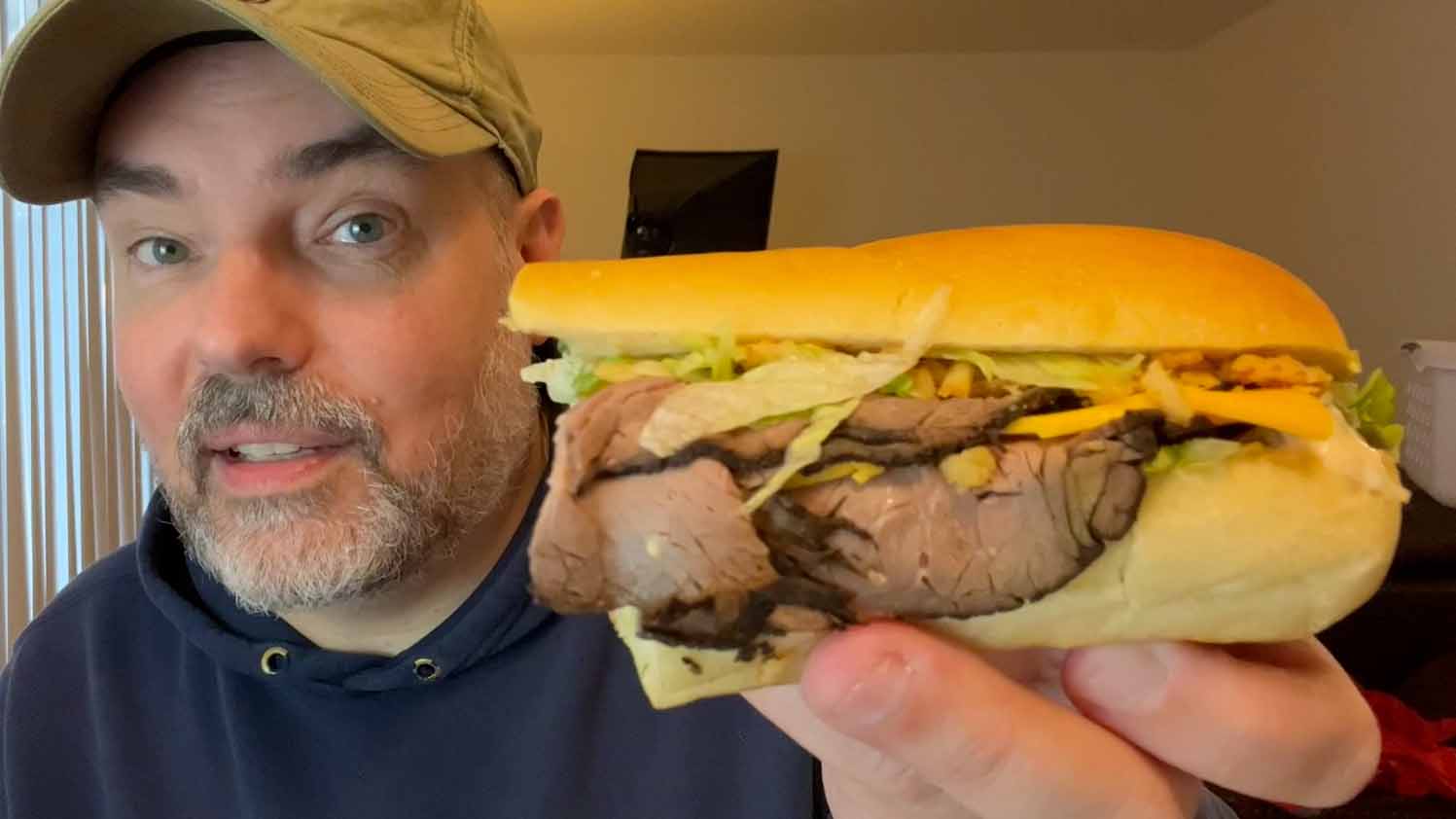 Matt Calkins with the All-American Beefy Crunch sandwich from Jimmy John's