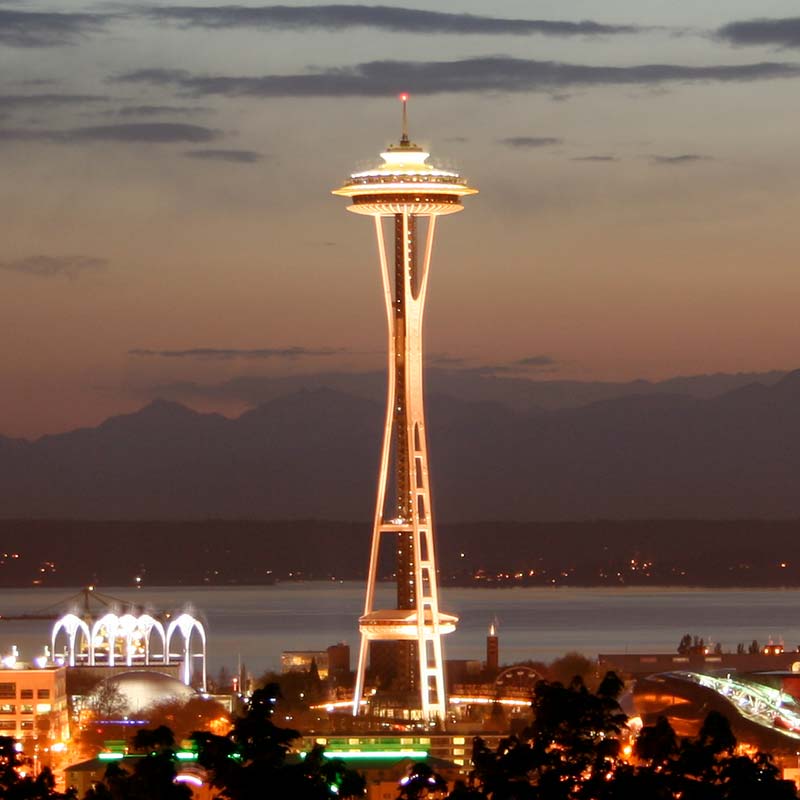 The Space Needle and Pacific Science Center in Seattle at dusk.